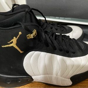 Jordan Black White Mid-Top Basketball Shoes with Gold Accents